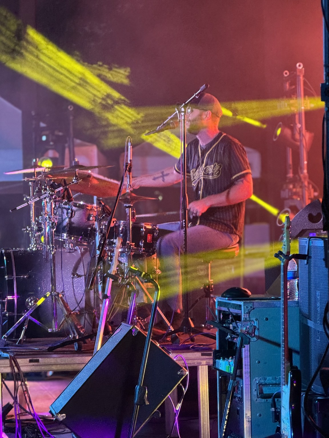 BakBeatz drummer performing under stage lights