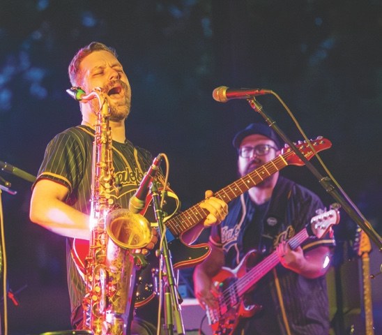 BakBeatz sax player and bassist performing