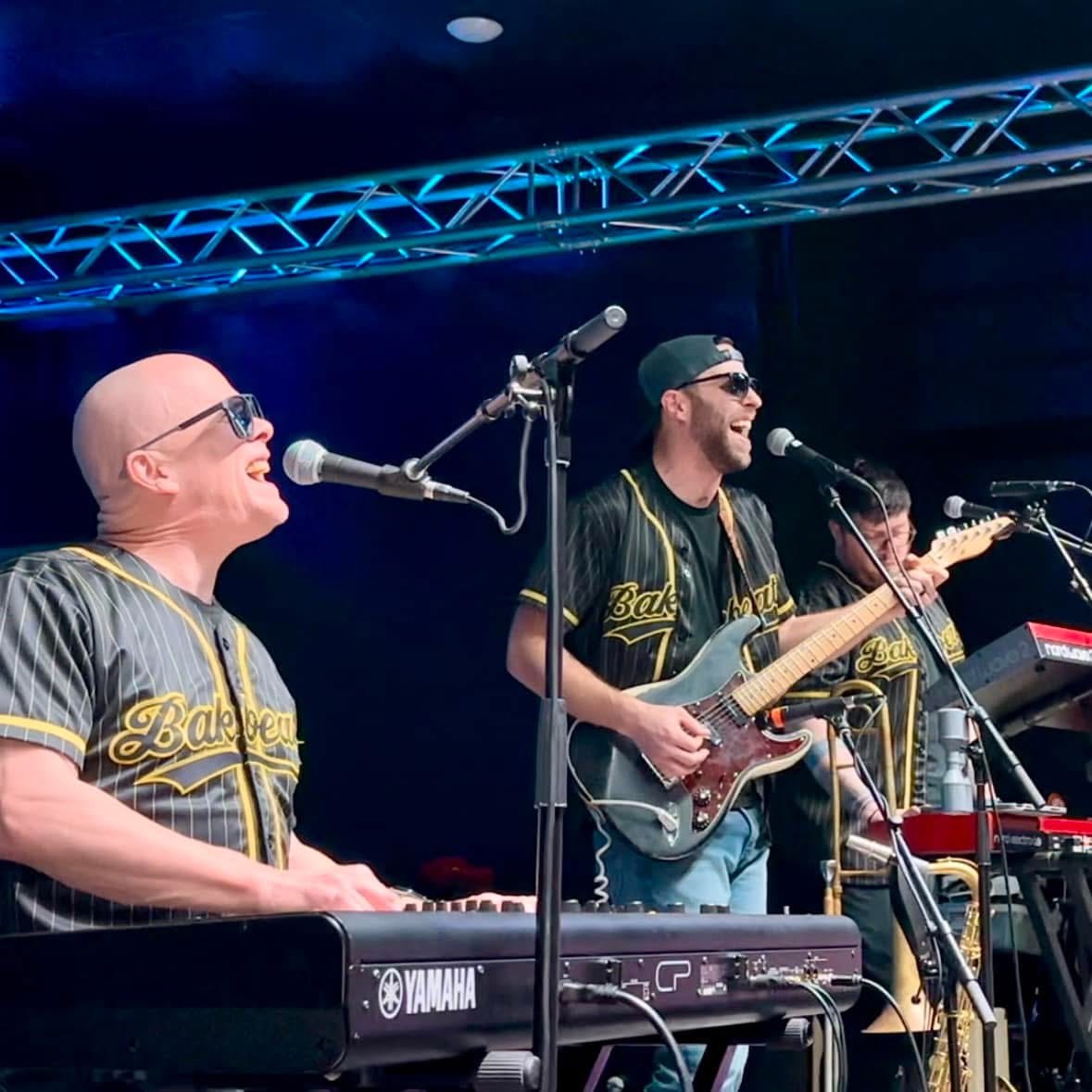 Todd East and The BakBeatz performing live with vocals, guitar and horns
